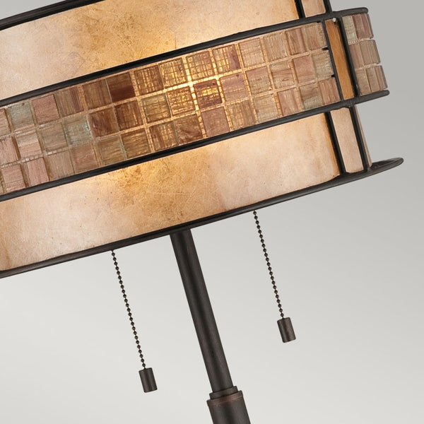 A close-up of the lamp shade, highlighting the textured glass mosaic band.