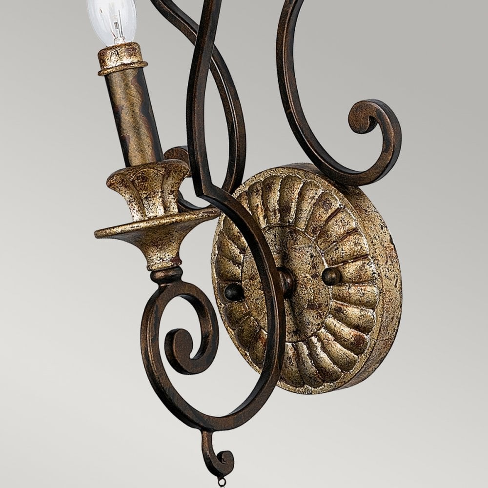 Angled view of the vintage-style wall sconce, showing the textured base plate.