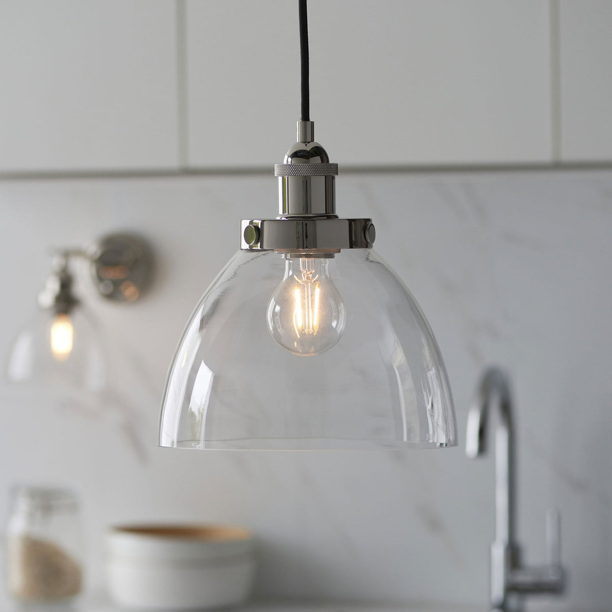Chickerell Pendant in a Bright Nickel Finish with Clear Glass