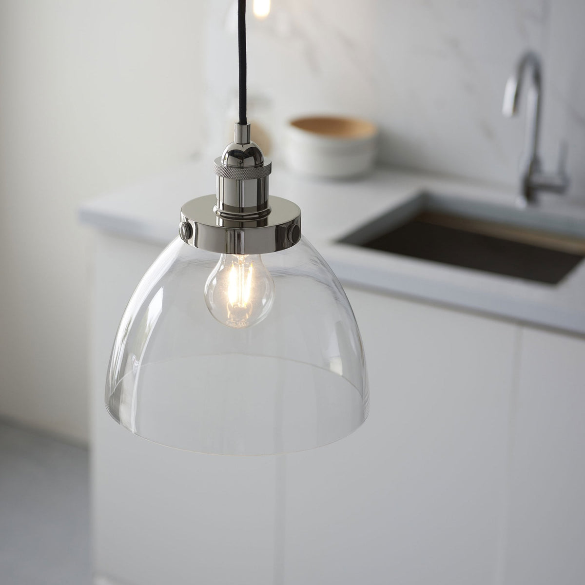 Chickerell Pendant in a Bright Nickel Finish with Clear Glass