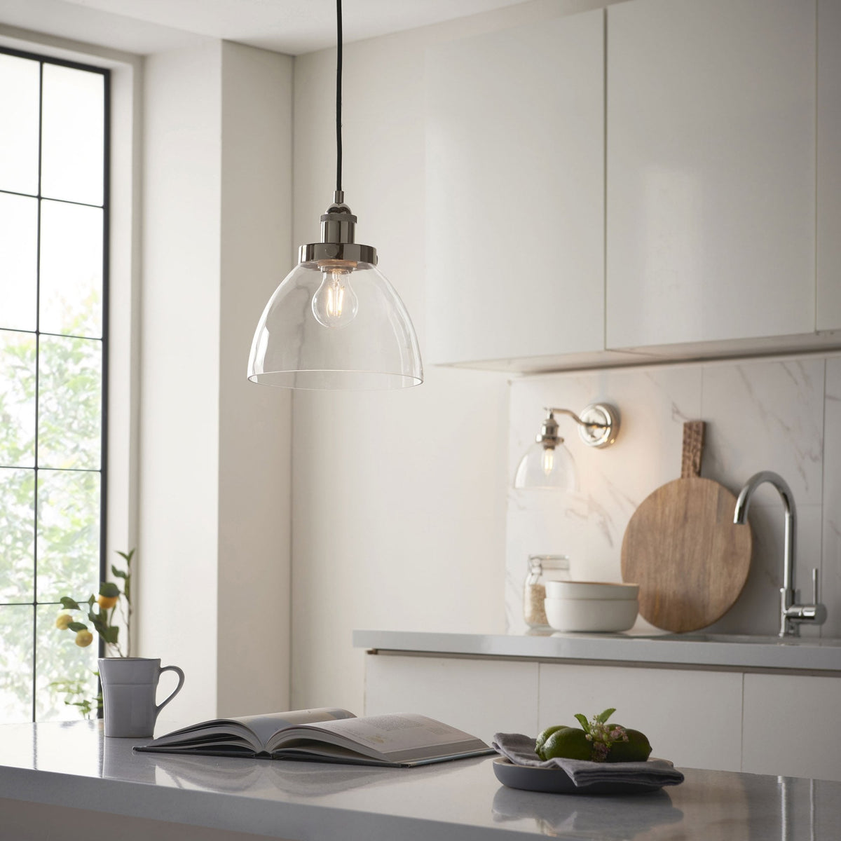 Hansen Switched Wall Light in a Bright Nickel Finish with Clear Glass
