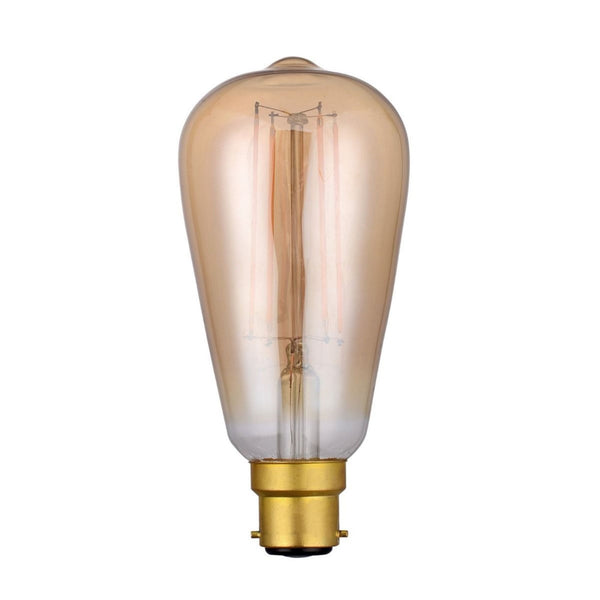 A vintage style filament light bulb with a gold-coloured base and warm amber glass.