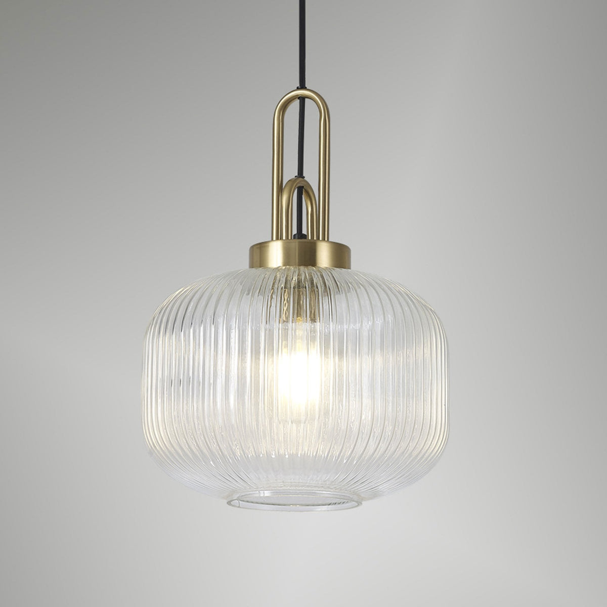 Atherington Pumpkin Pendant in Brass Gold & Clear Shade