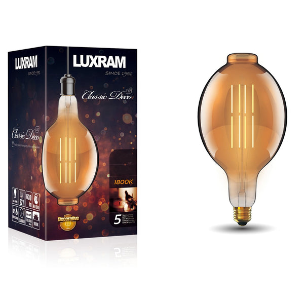 A large, oval, amber-tinted LED bulb is displayed next to its Luxram 'Classic Deco' packaging.