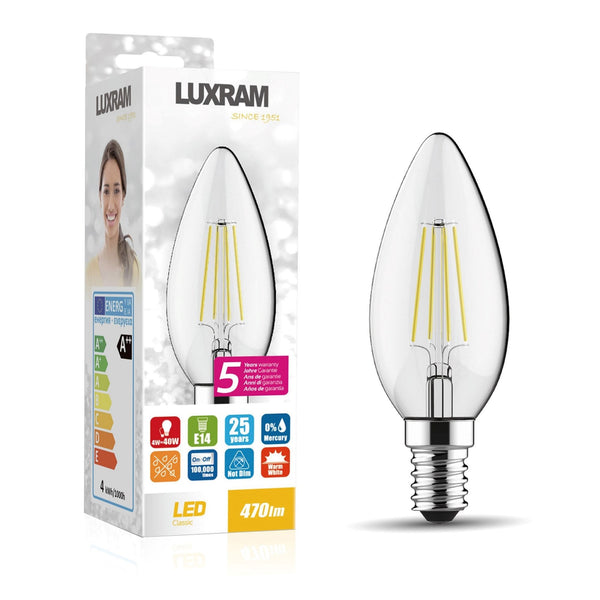 A Luxram LED light bulb in its packaging next to an identical bulb without packaging.