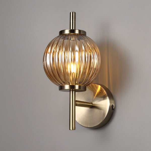 Fiddleford Wall Lamp in Antique Brass and Amber Glass