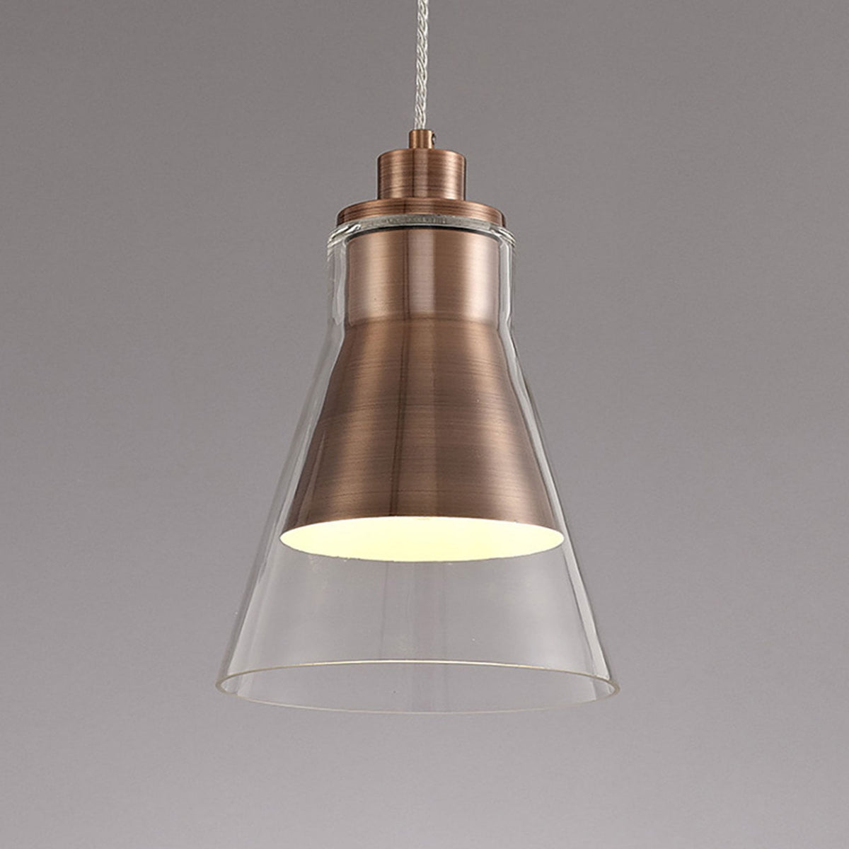 Huxham Single Pendant in Antique Copper with Clear Glass