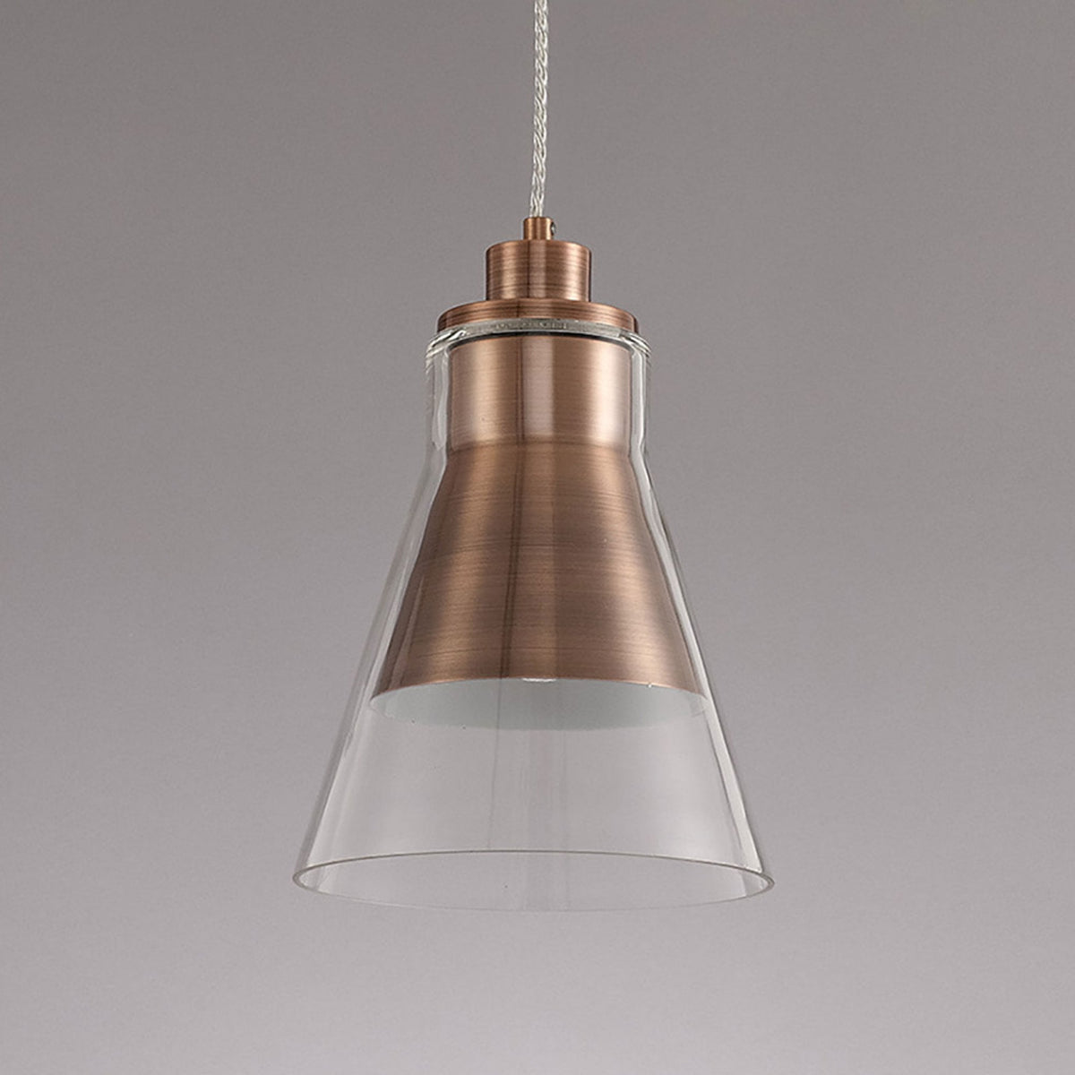 Huxham Single Pendant in Antique Copper with Clear Glass