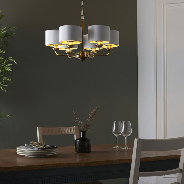 Highclere Six Arm Pendant in Antique Brass with Vintage White Shades