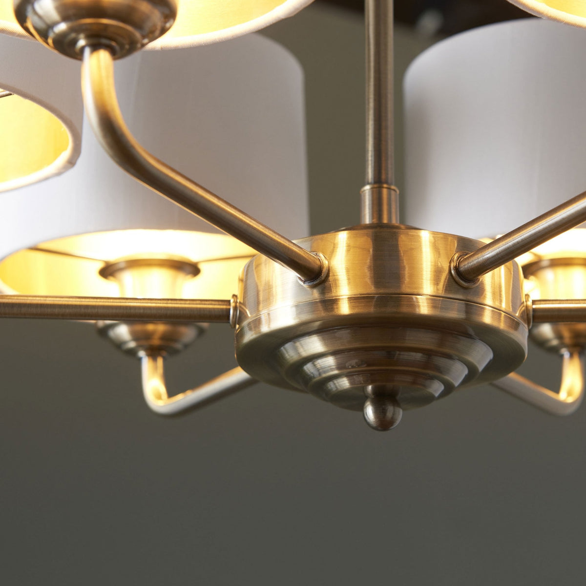 Highclere Six Arm Pendant in Antique Brass with Vintage White Shades