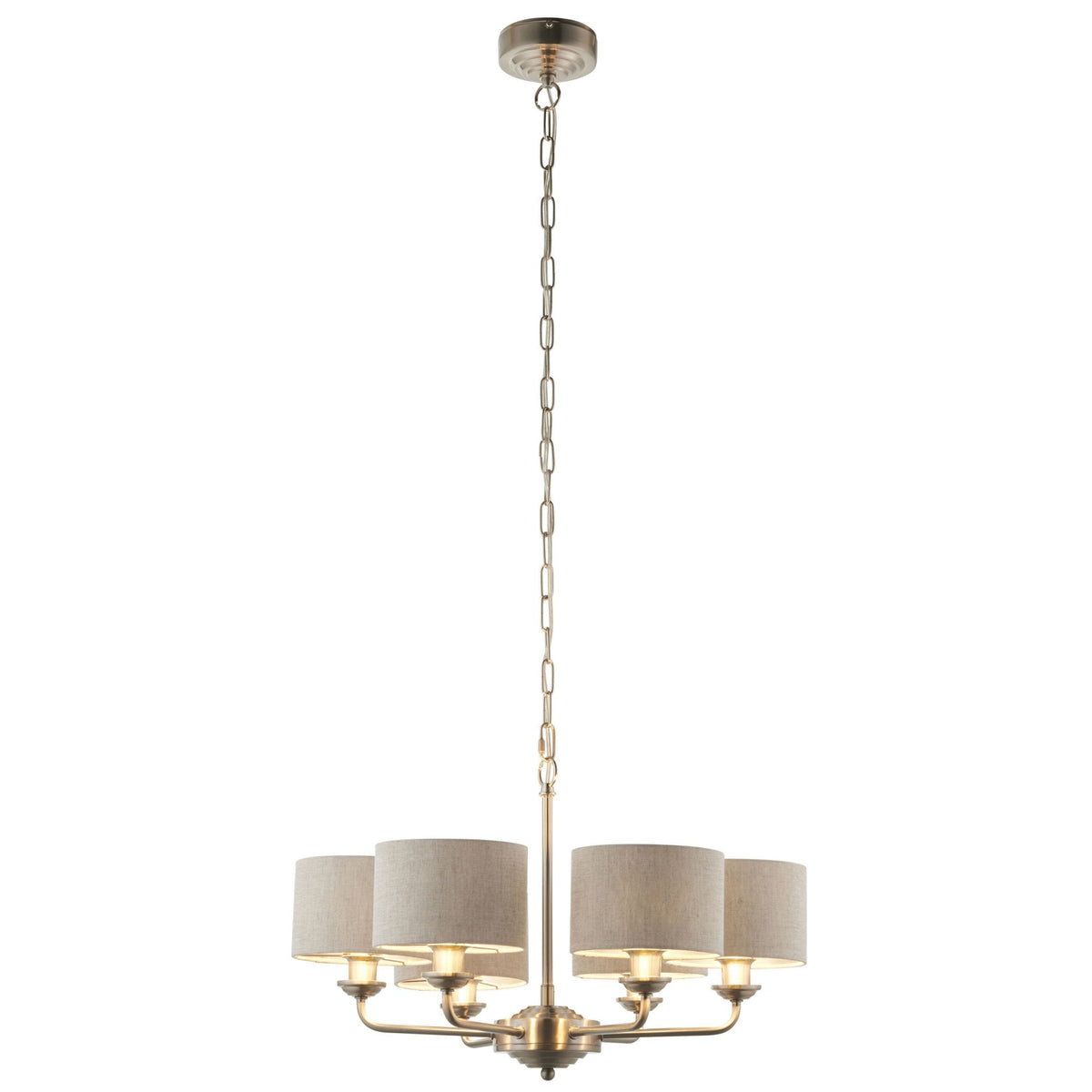 A five-light chandelier with grey fabric shades hangs from a chain on a white background.