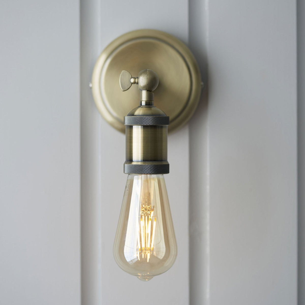 Hal Single Antique Brass Wall Light