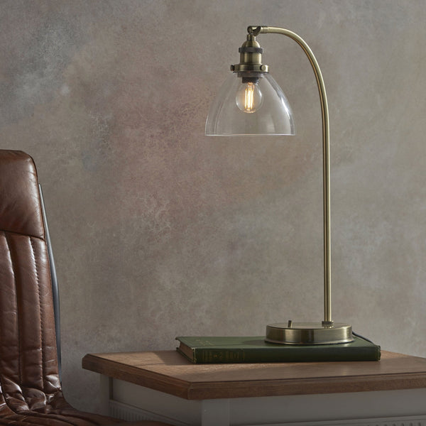 Hansen Task Table Lamp in Antique Brass and Clear Glass Shade