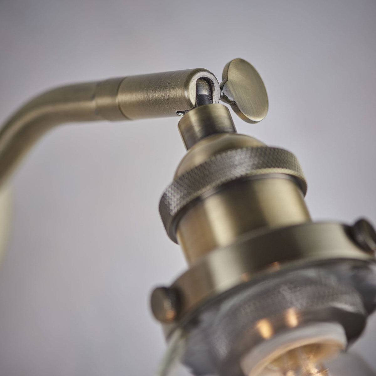 Hansen Wall Light in Antique Brass and Clear Glass Shade