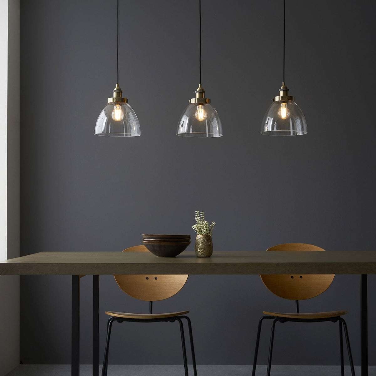 Hansen Triple Drop Linear Pendant in Antique Brass and Clear Glass Shades