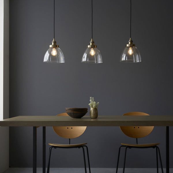 Hansen Triple Drop Linear Pendant in Antique Brass and Clear Glass Shades