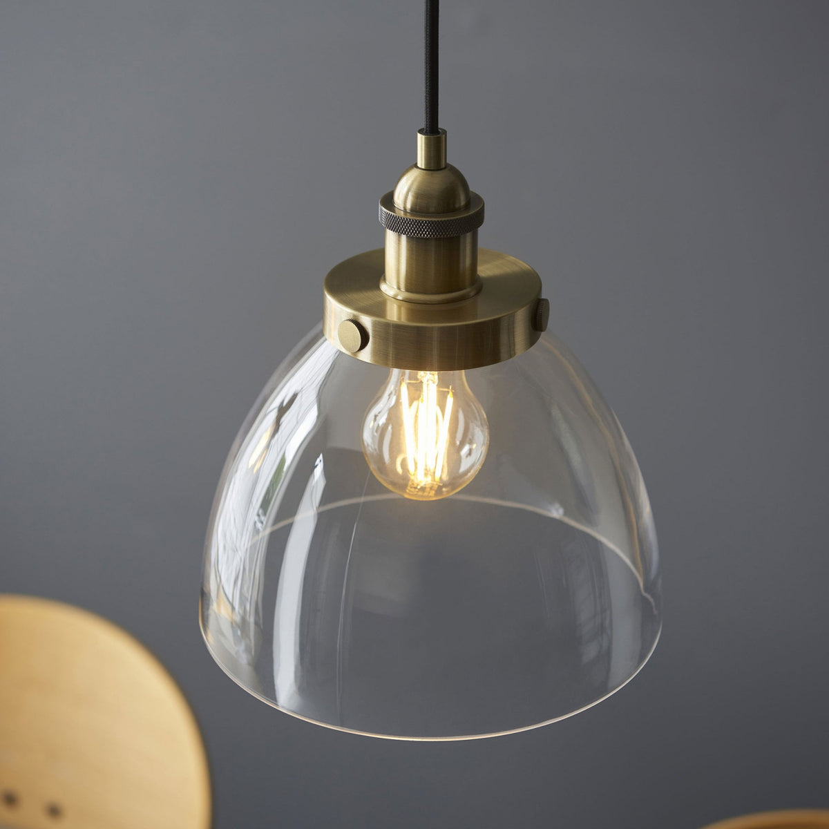 Hansen Triple Drop Linear Pendant in Antique Brass and Clear Glass Shades