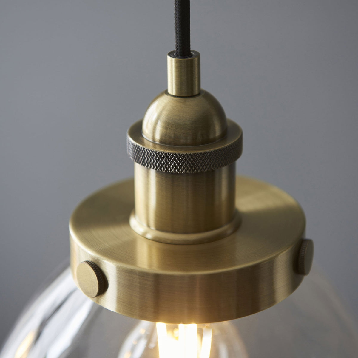 Hansen Triple Drop Linear Pendant in Antique Brass and Clear Glass Shades