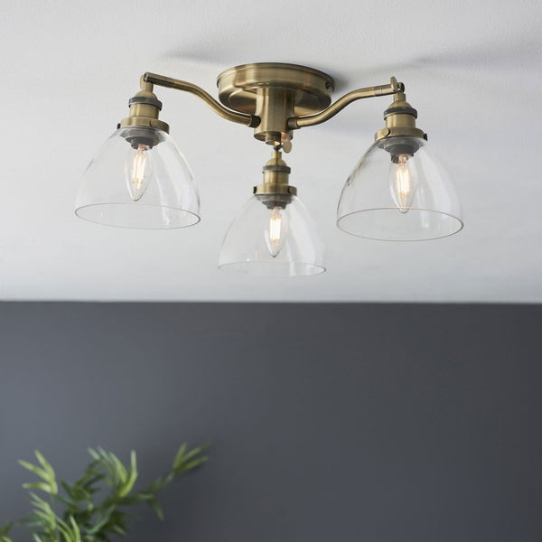 Hansen Three Arm Semi Flush Light in Antique Brass and Clear Glass Shades