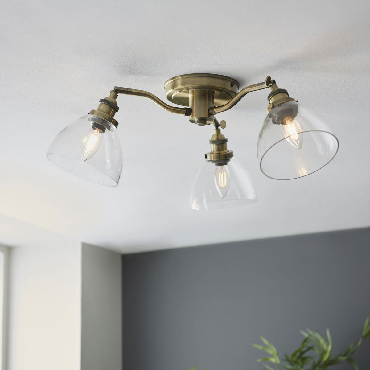 Hansen Three Arm Semi Flush Light in Antique Brass and Clear Glass Shades