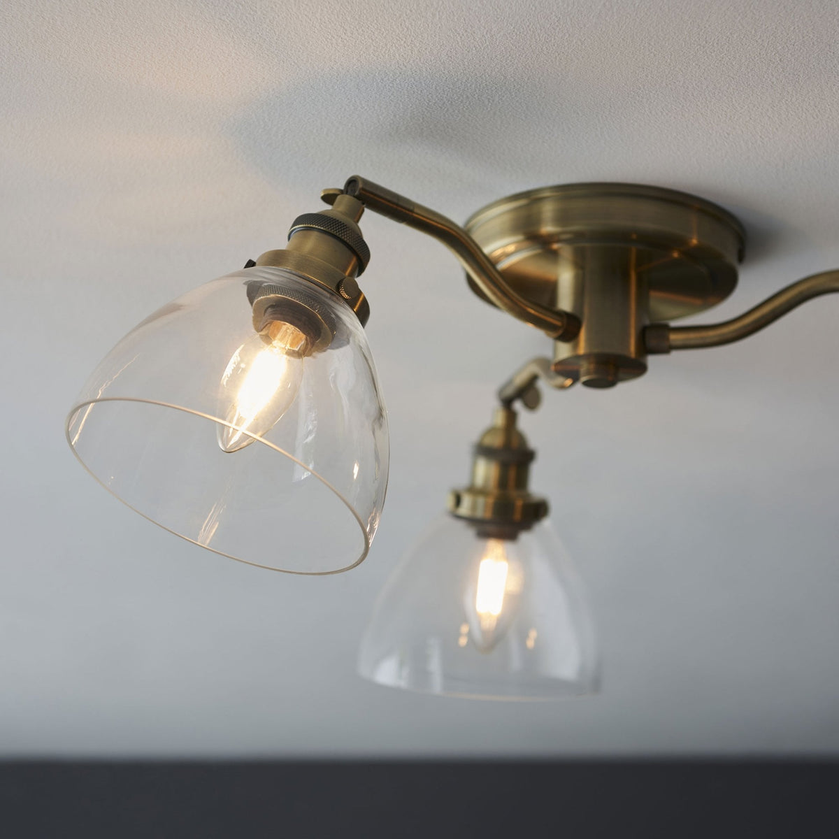 Hansen Three Arm Semi Flush Light in Antique Brass and Clear Glass Shades