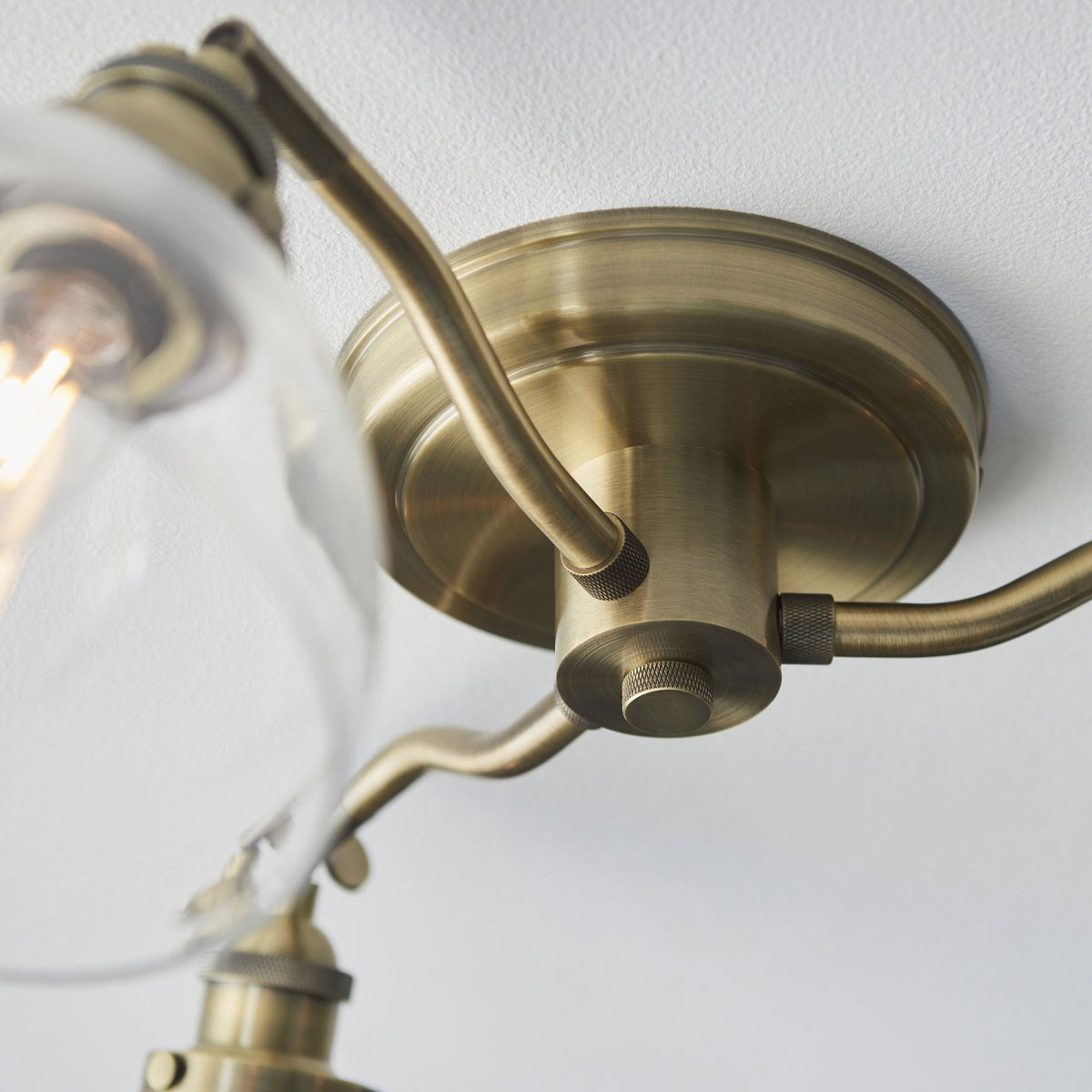 Hansen Three Arm Semi Flush Light in Antique Brass and Clear Glass Shades