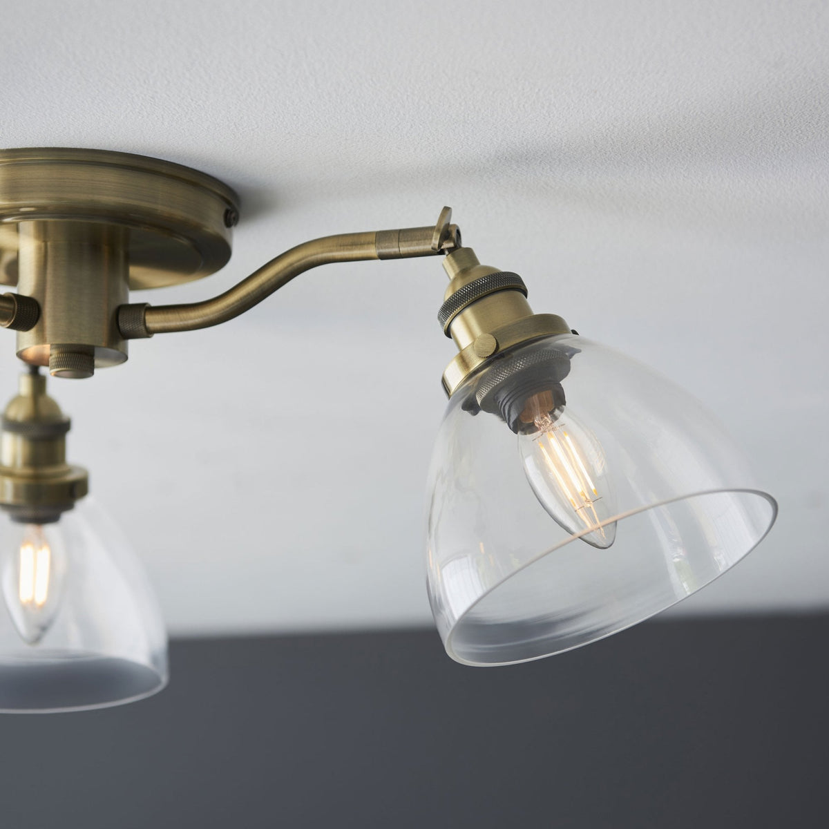 Hansen Three Arm Semi Flush Light in Antique Brass and Clear Glass Shades