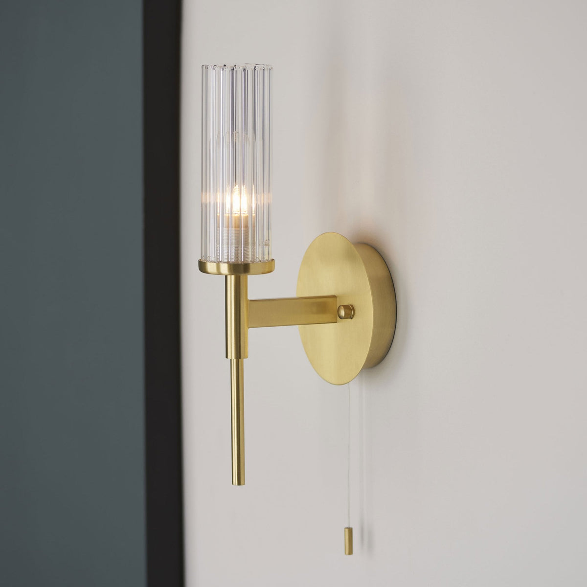 Talo Switched IP44 Wall Light in Satin Brass
