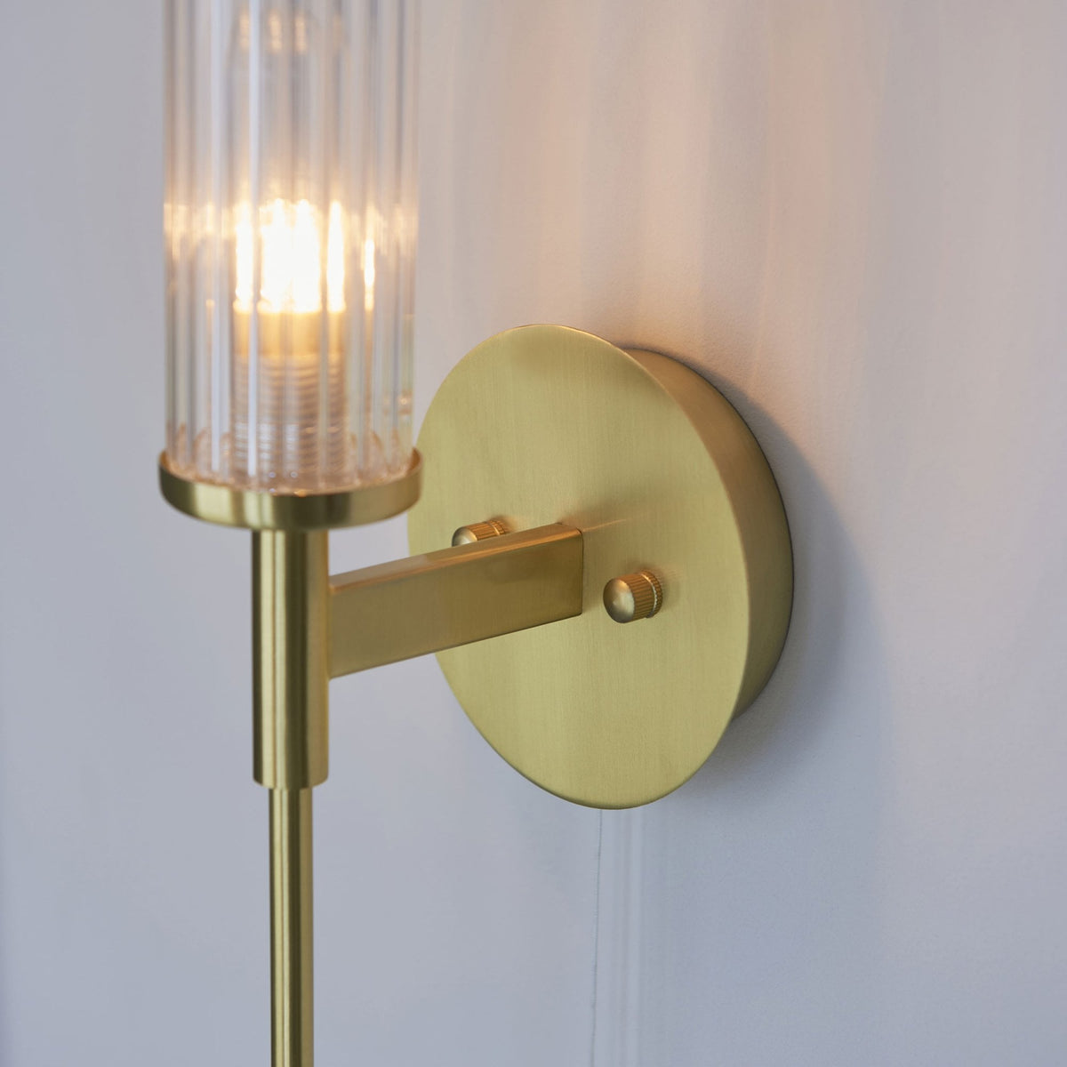 Talo Switched IP44 Wall Light in Satin Brass