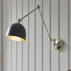 Lehal Swing Arm Wall Light in Polished Nickel & Matt Black