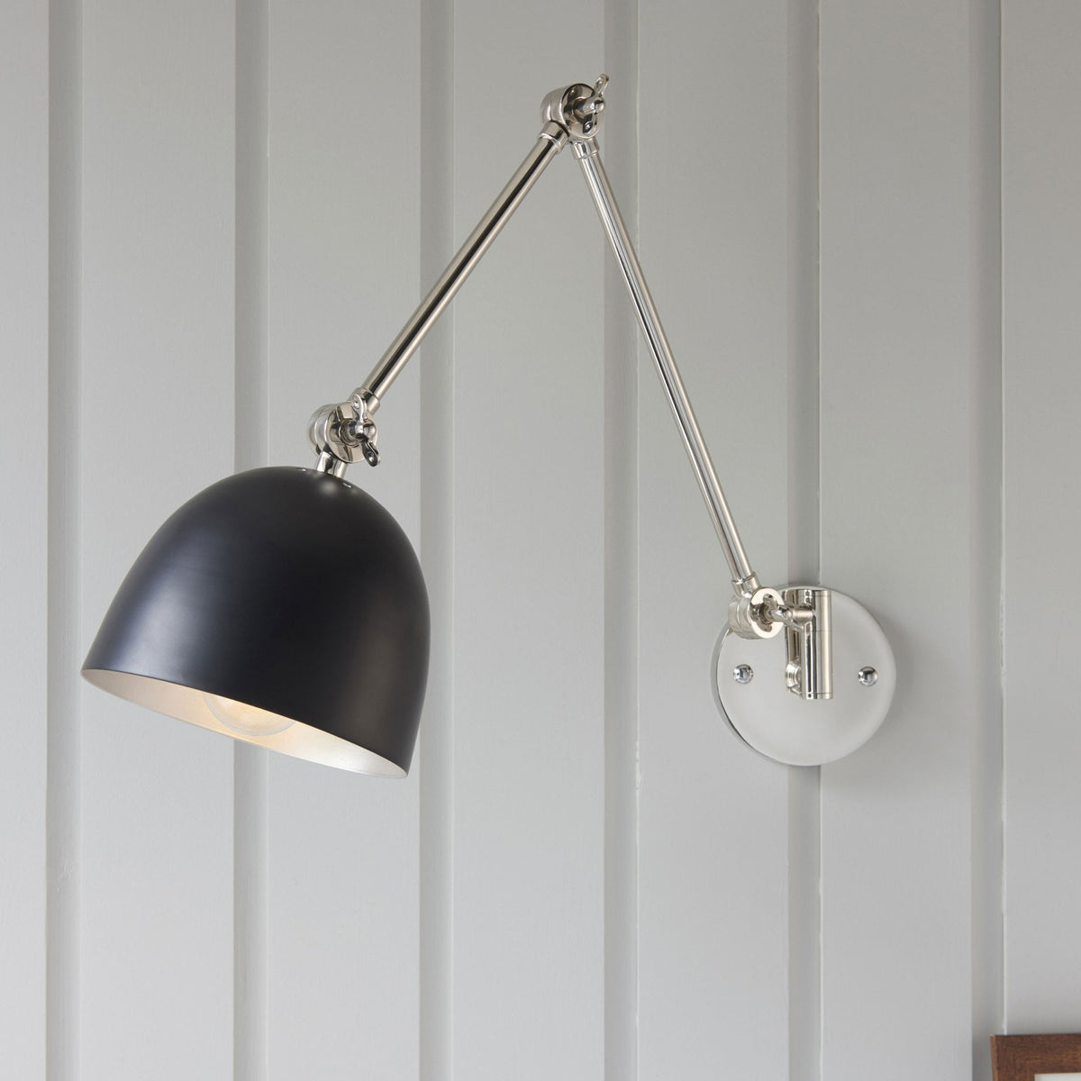 Lehal Swing Arm Wall Light in Polished Nickel & Matt Black