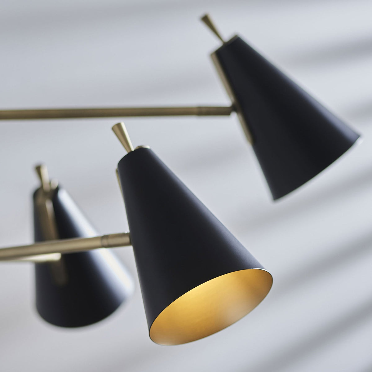 Everett Six Light Multi Arm Pendant in Matt Antique Brass & Matt Black