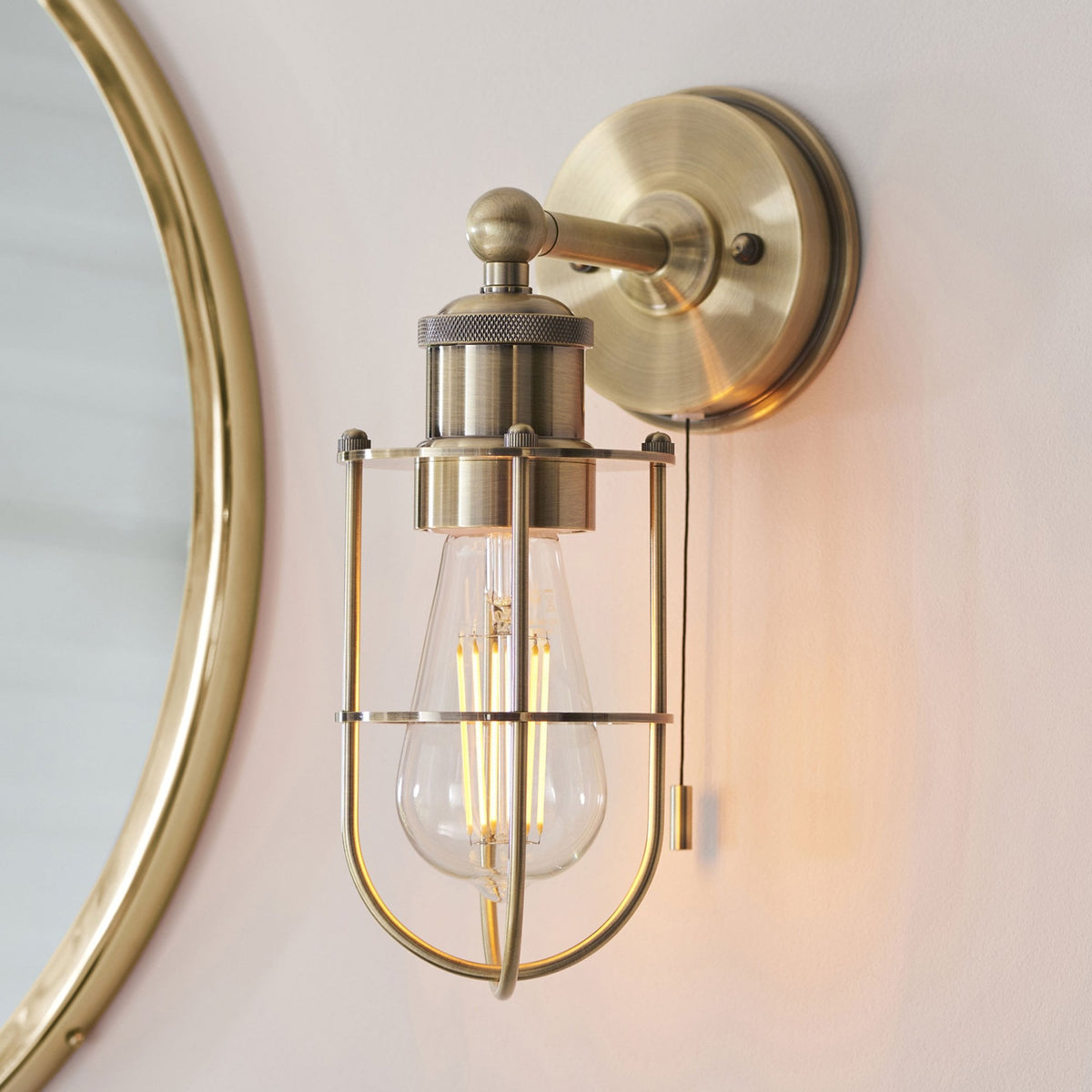Crew Caged IP44 Switched Wall Light in Antique Brass