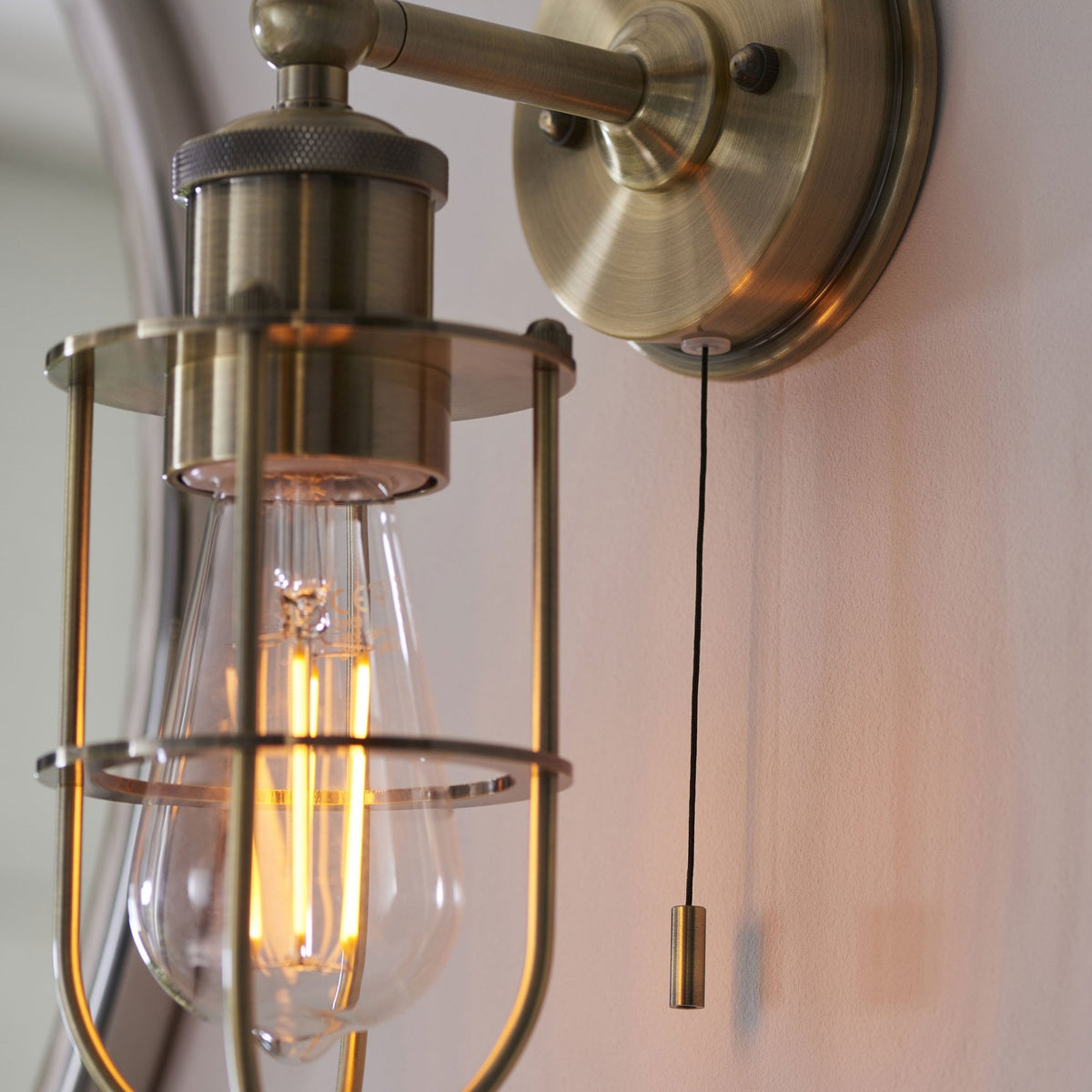 Crew Caged IP44 Switched Wall Light in Antique Brass