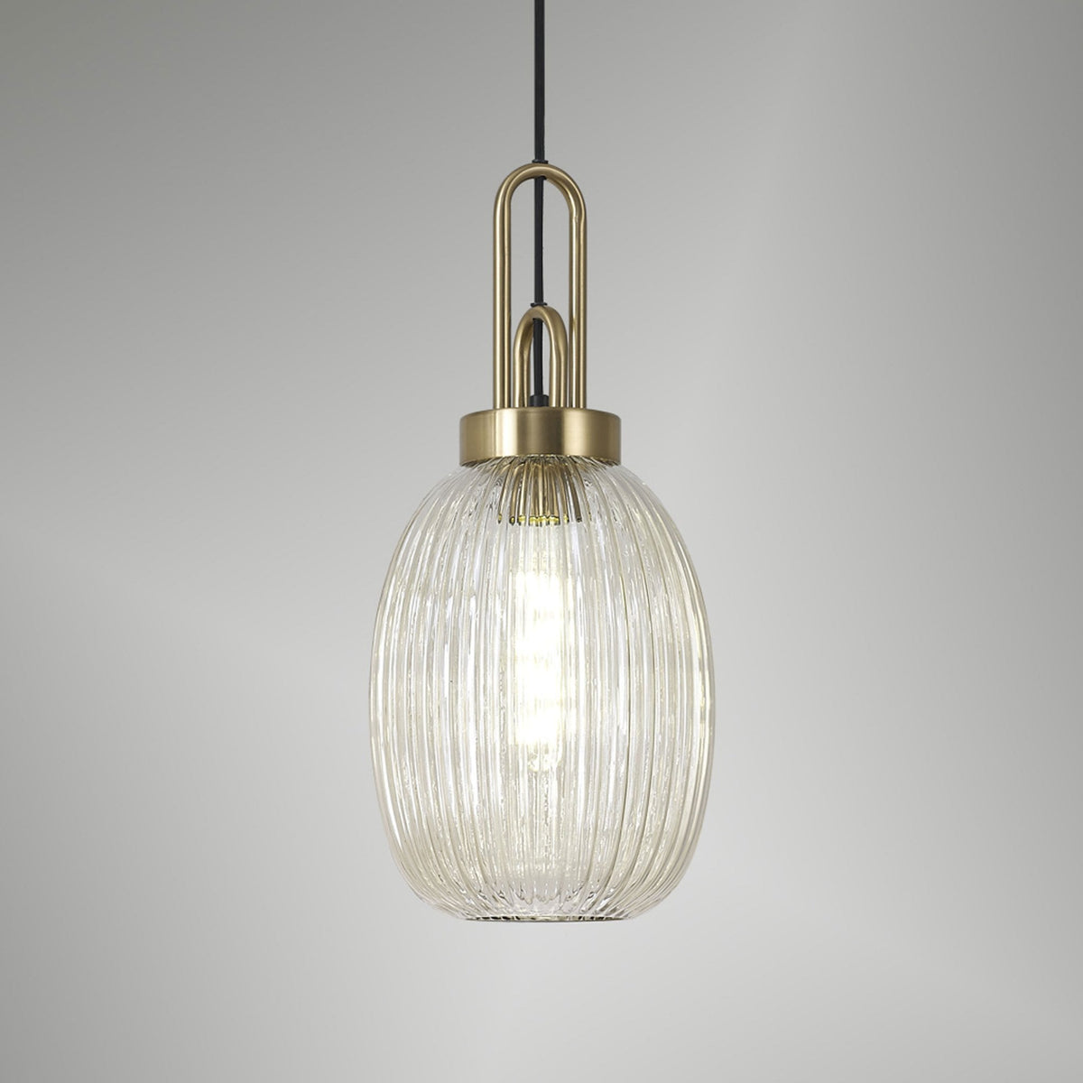 Atherington Almond Pendant in Brass Gold & Champagne Ribbed Shade