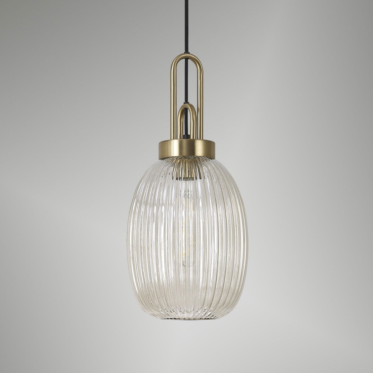Atherington Almond Pendant in Brass Gold & Champagne Ribbed Shade