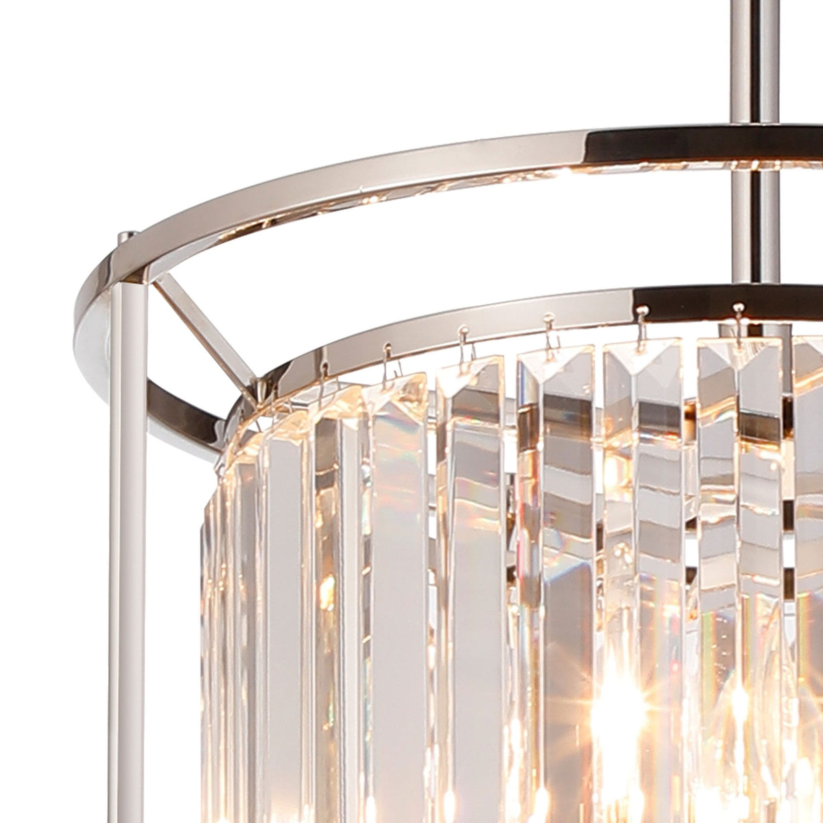 Close-up of a modern chandelier with rectangular crystal prisms and a polished chrome frame.