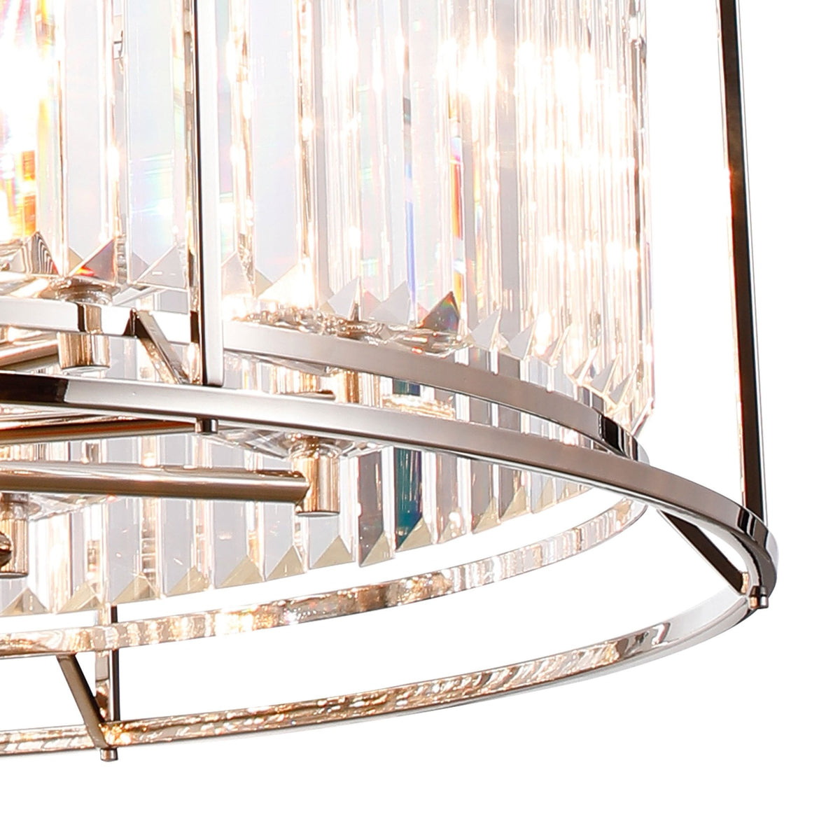 Close-up of a modern chandelier with clear crystal rods and polished chrome accents.