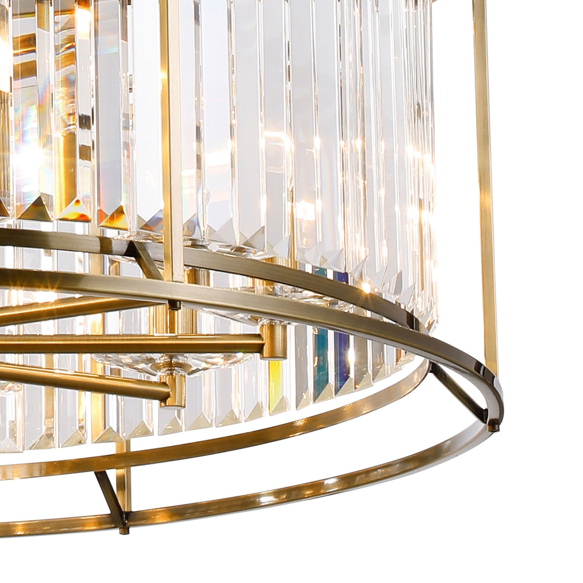 Close-up of a luxurious chandelier with clear crystal rods and a bronze frame, reflecting light.