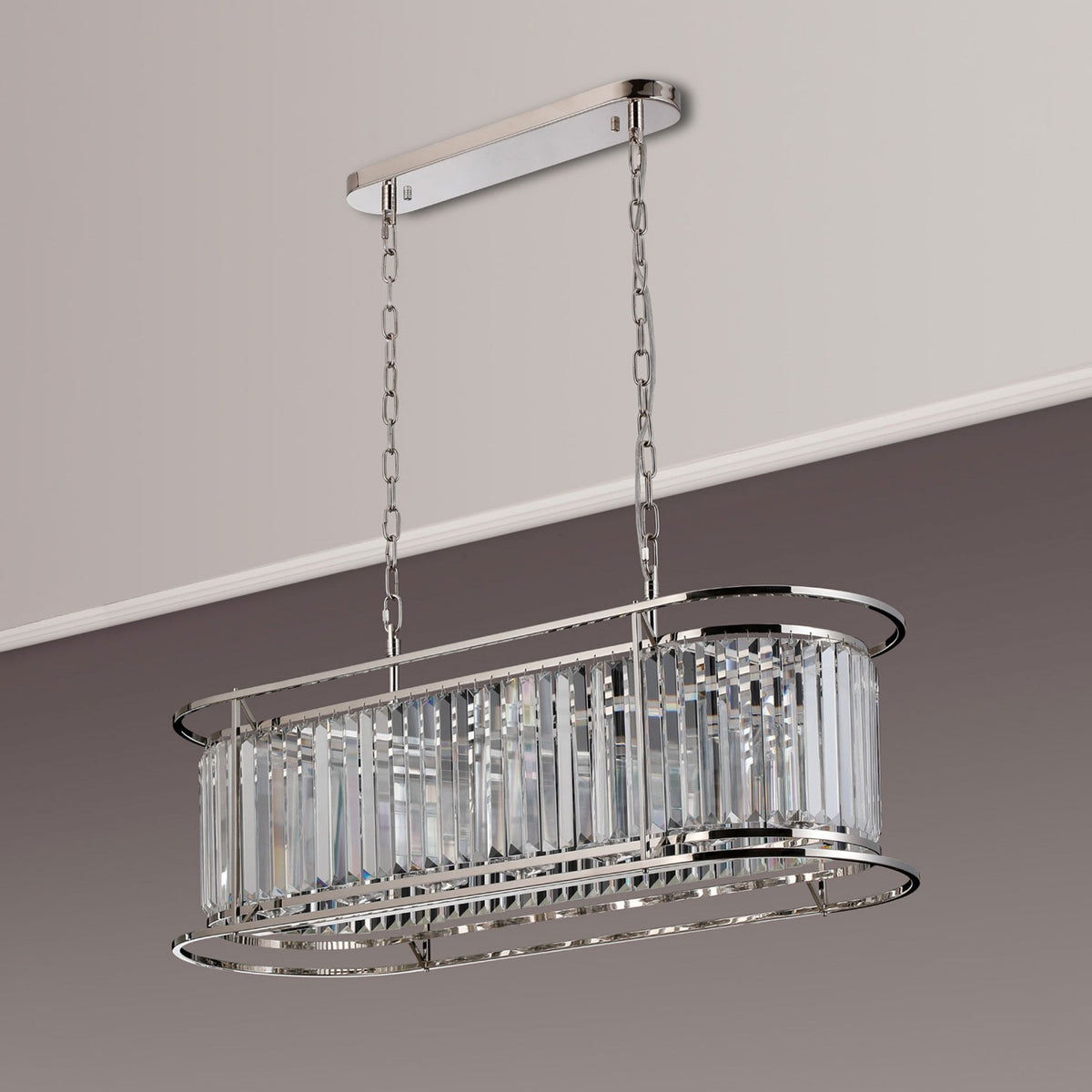 Rectangular crystal chandelier with polished nickel frame and chains, hanging from a white ceiling.