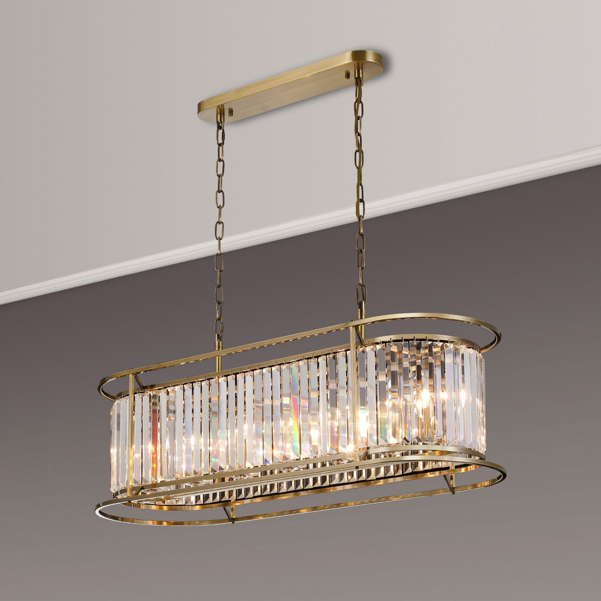 Torrington 7 Lamp Oval Pendant in Antique Brass with Clear Crystals