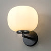 Milton Small Oval Ball Wall Light in Matt Black & Frosted White Shade
