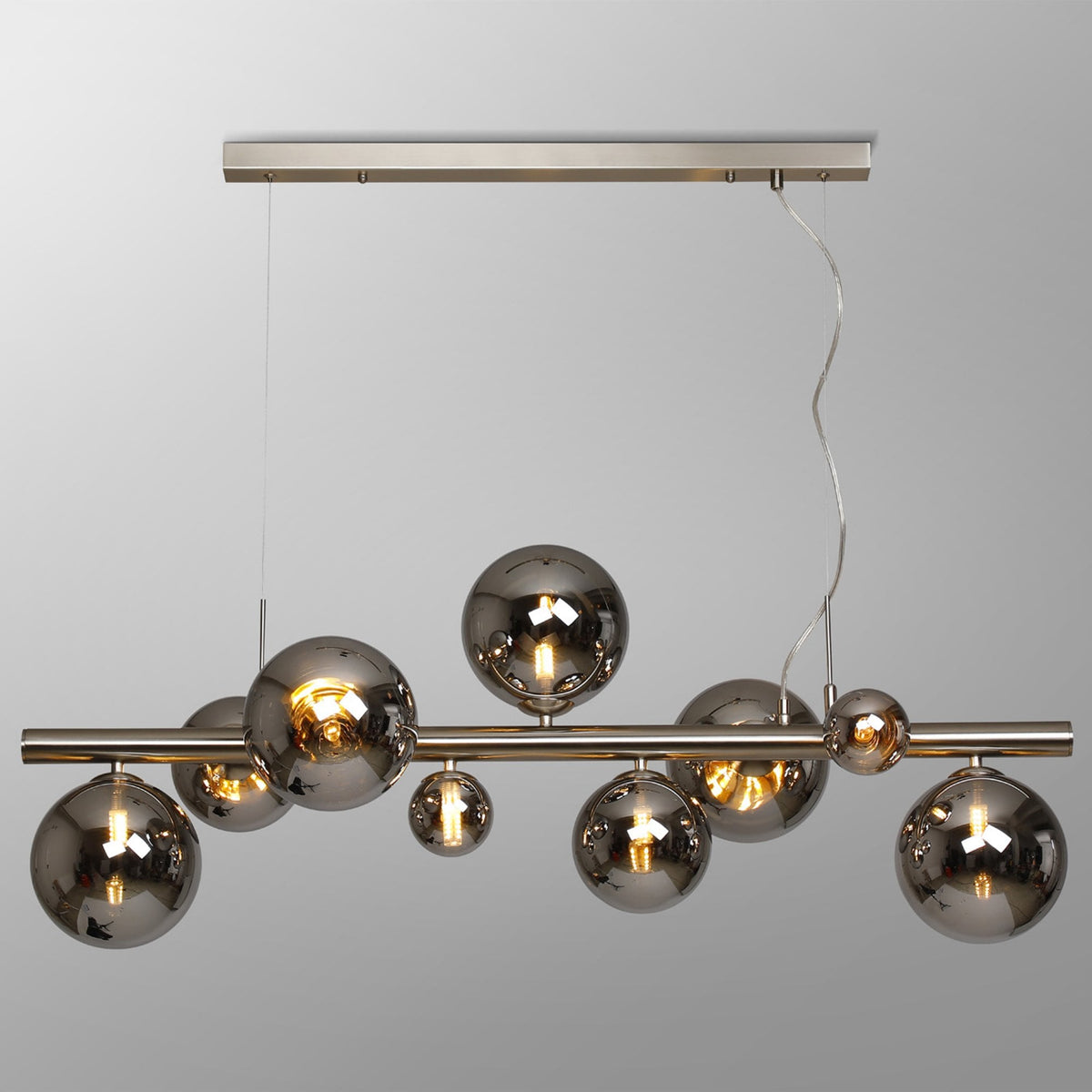 Modern linear chandelier with nine smoked glass globe shades
