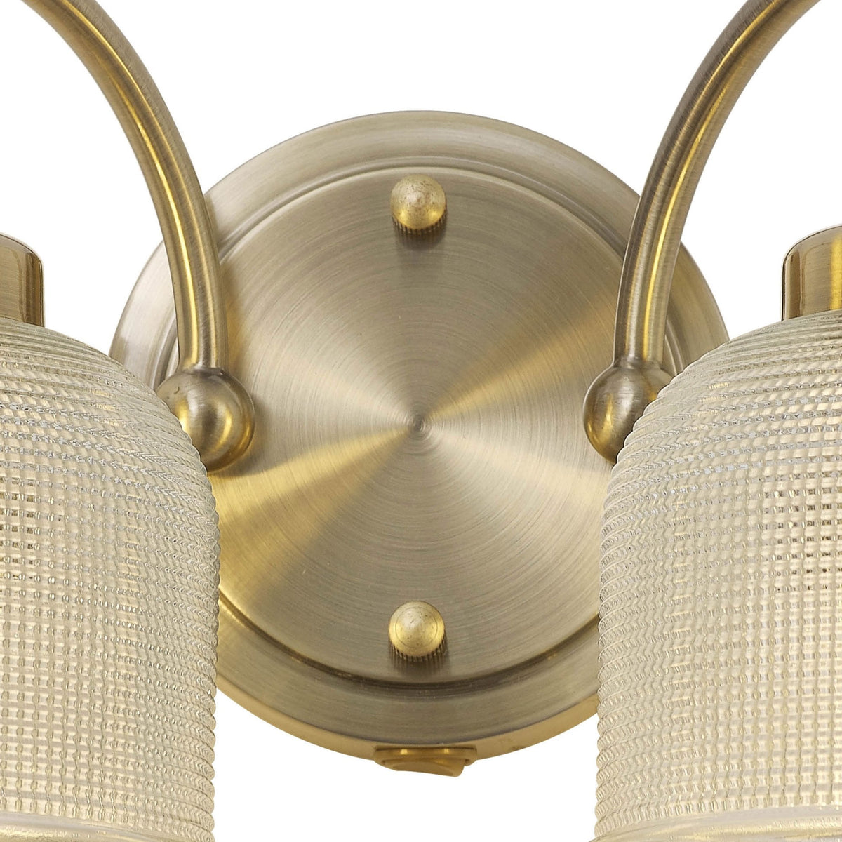 Stowford Switched Twin Wall Light in Antique Brass & Clear Prismatic Glass