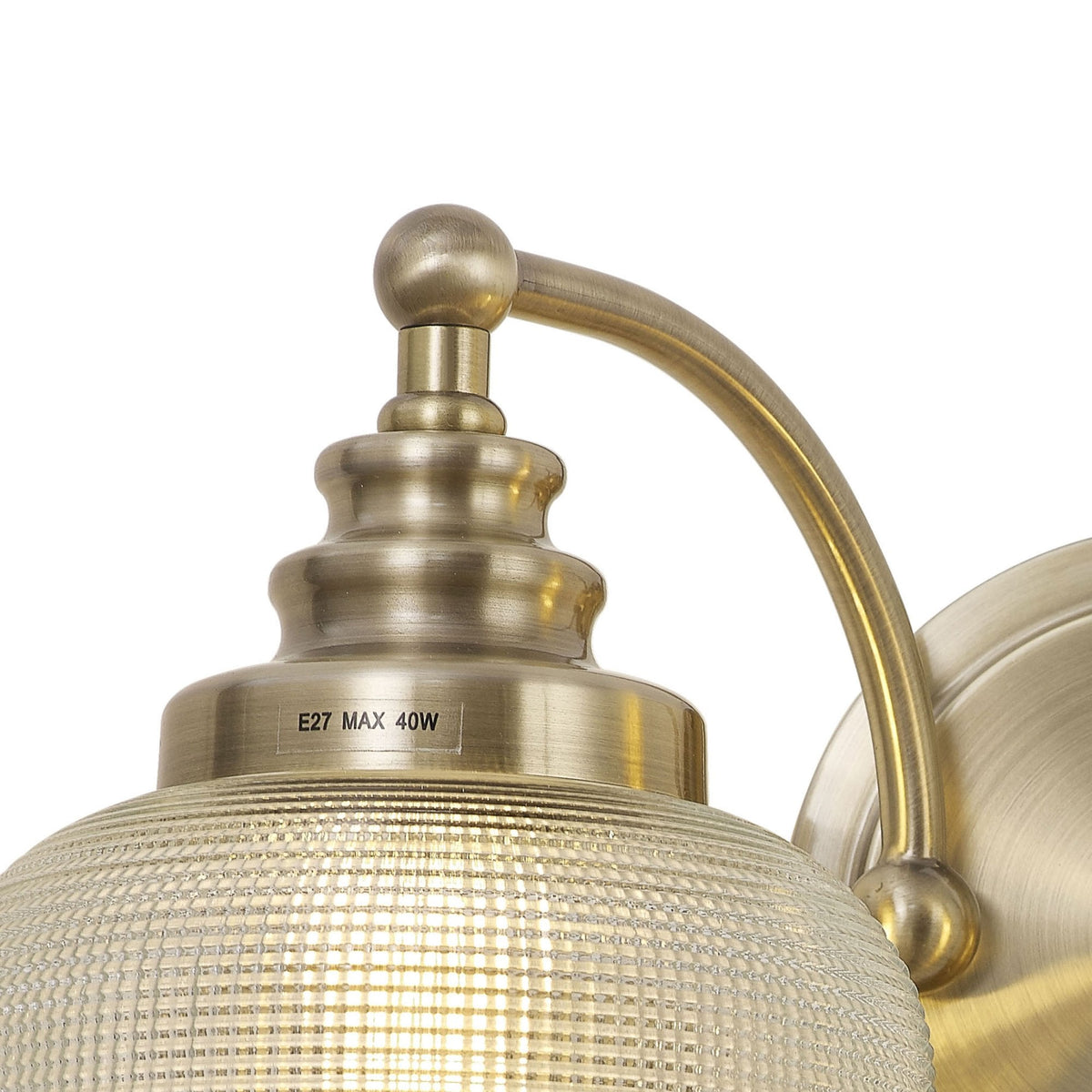 Stowford Switched Twin Wall Light in Antique Brass & Clear Prismatic Glass