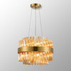 Kelly Ten Light Pendant in Brass & Amber Glass