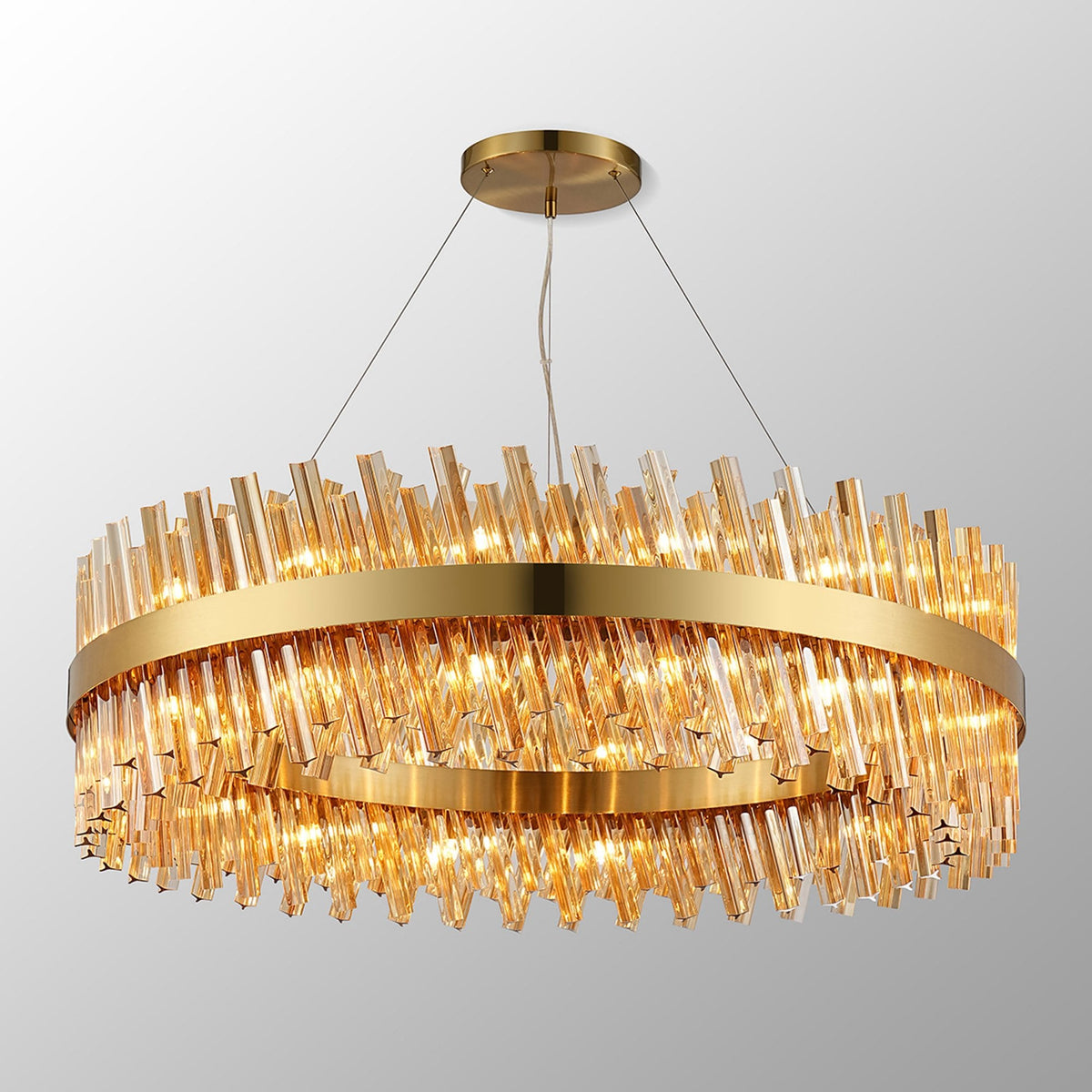 Kelly Thirty Two Light Pendant in Brass & Amber Glass