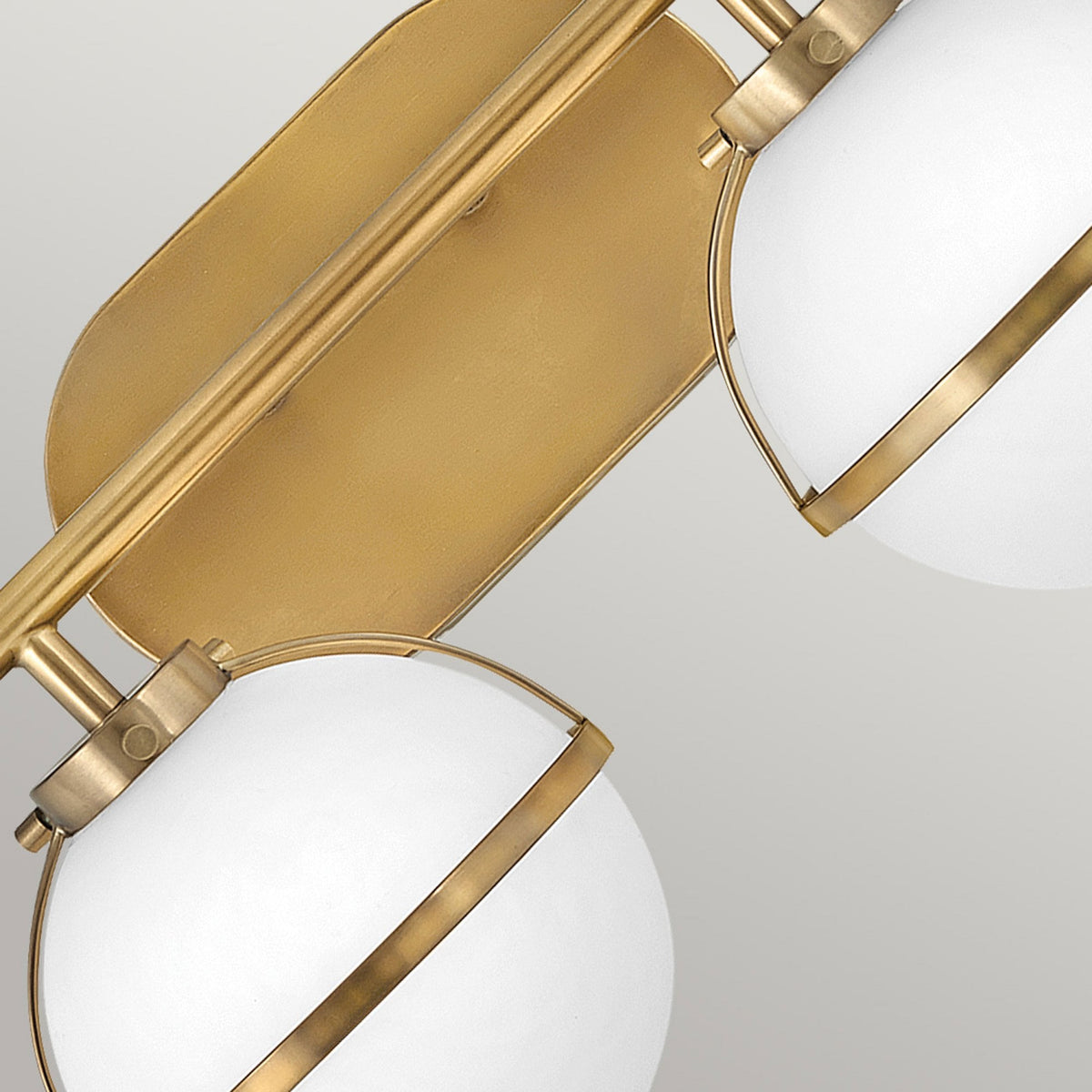 Hollis IP44 Twin Wall Light in Heritage Brass with Opal Glass