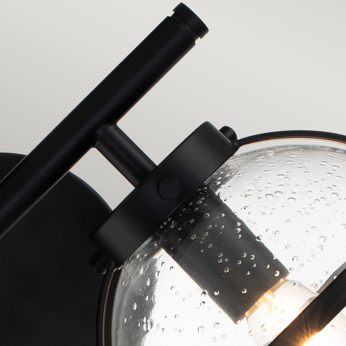 Hollis IP44 Twin Wall Light in Black with Clear Seeded Glass