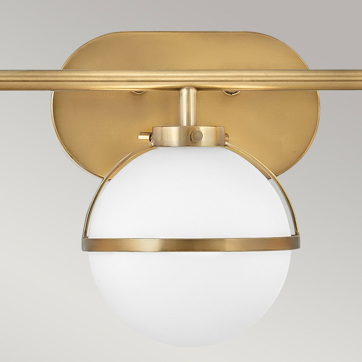 Hollis IP44 Triple Wall Light in Heritage Brass with Opal Glass